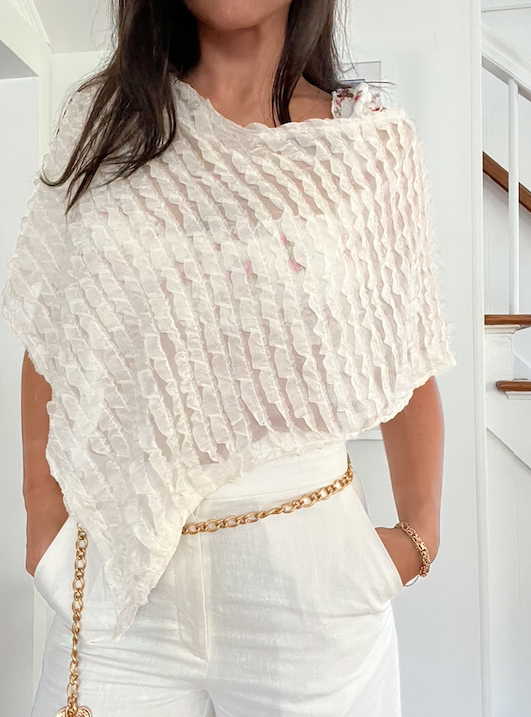 white ruffle poncho